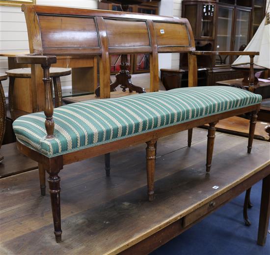 A French fruitwood hall seat W.153cm